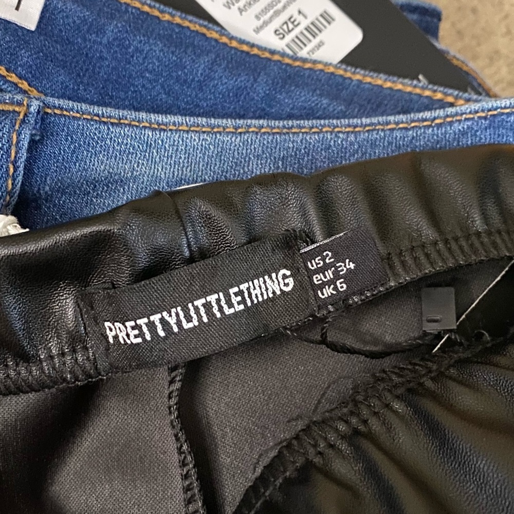 Black pretty little things pants, with a hem spilt.